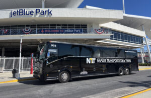 NT&T motor coach outside JetBlue Park